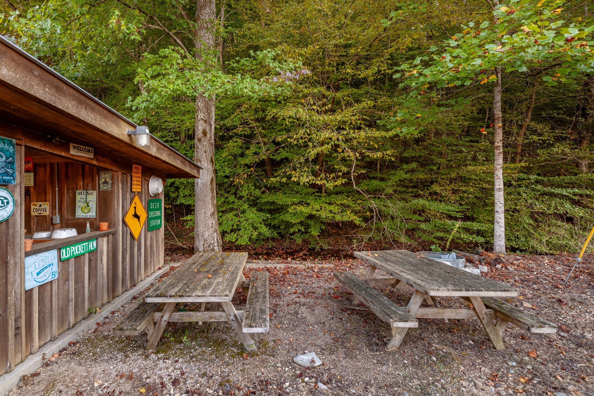 0 Puckett Hollow Road Centerville, TN 37033 - Photo 25 of 53 a view of a patio with table and chairs with wooden fence and floor