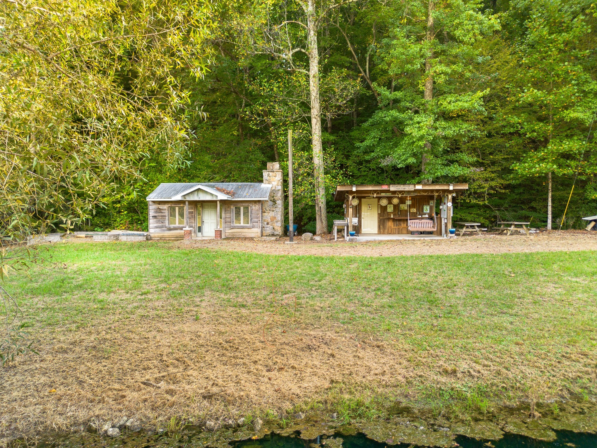 0 Puckett Hollow Road Centerville, TN 37033 - Photo 39 of 53 a view of house with backyard outdoor seating and barbeque oven
