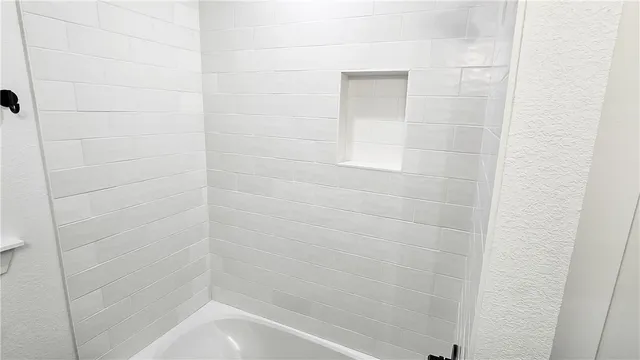 a bathroom with a bathtub