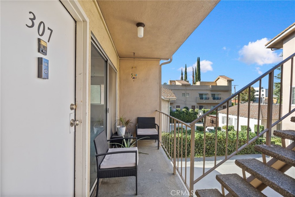 10757 Hortense, Unit 307 North Hollywood, CA 91602 - Photo 13 of 21 a view of a balcony with furniture