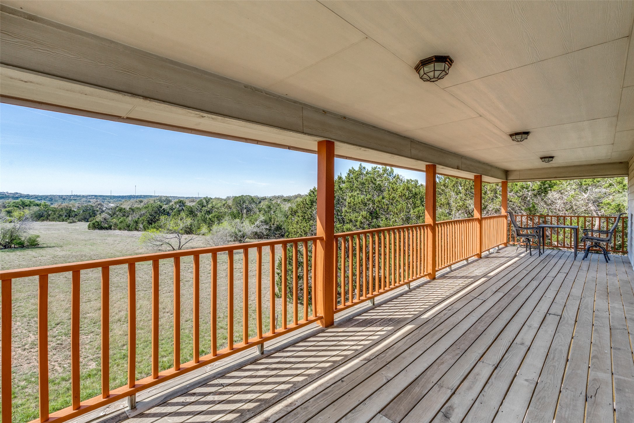 34970 Smithson Valley Road Bulverde, TX 78163 - Photo 20 of 36 a view of balcony with wooden floor