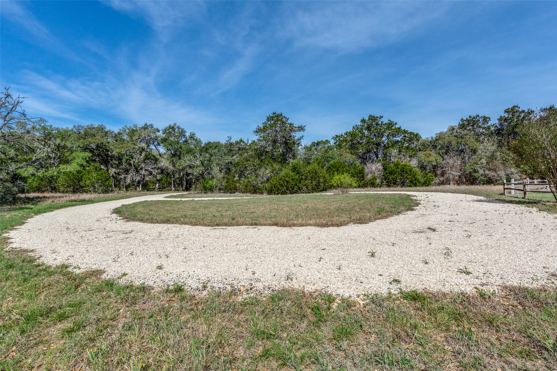 34970 Smithson Valley Road Bulverde, TX 78163 - Photo 24 of 36 a view of a dry yard with wooden fence