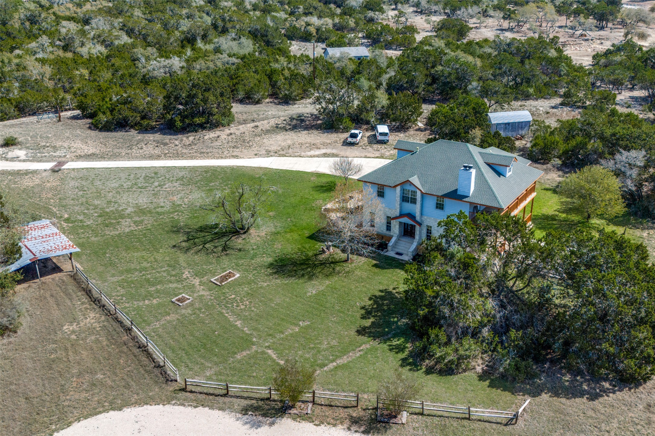 34970 Smithson Valley Road Bulverde, TX 78163 - Photo 30 of 36 an aerial view of a house with yard swimming pool and lake view