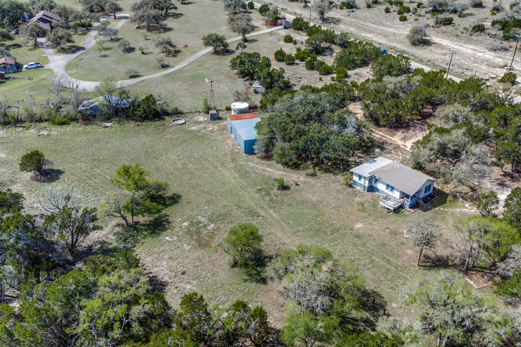 34970 Smithson Valley Road Bulverde, TX 78163 - Photo 31 of 36 an aerial view of a house with a yard