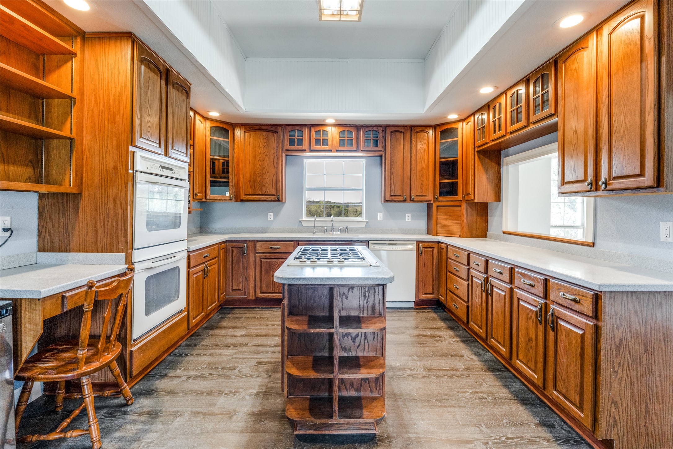 34970 Smithson Valley Road Bulverde, TX 78163 - Photo 4 of 36 a kitchen with stainless steel appliances granite countertop a stove a sink and a refrigerator