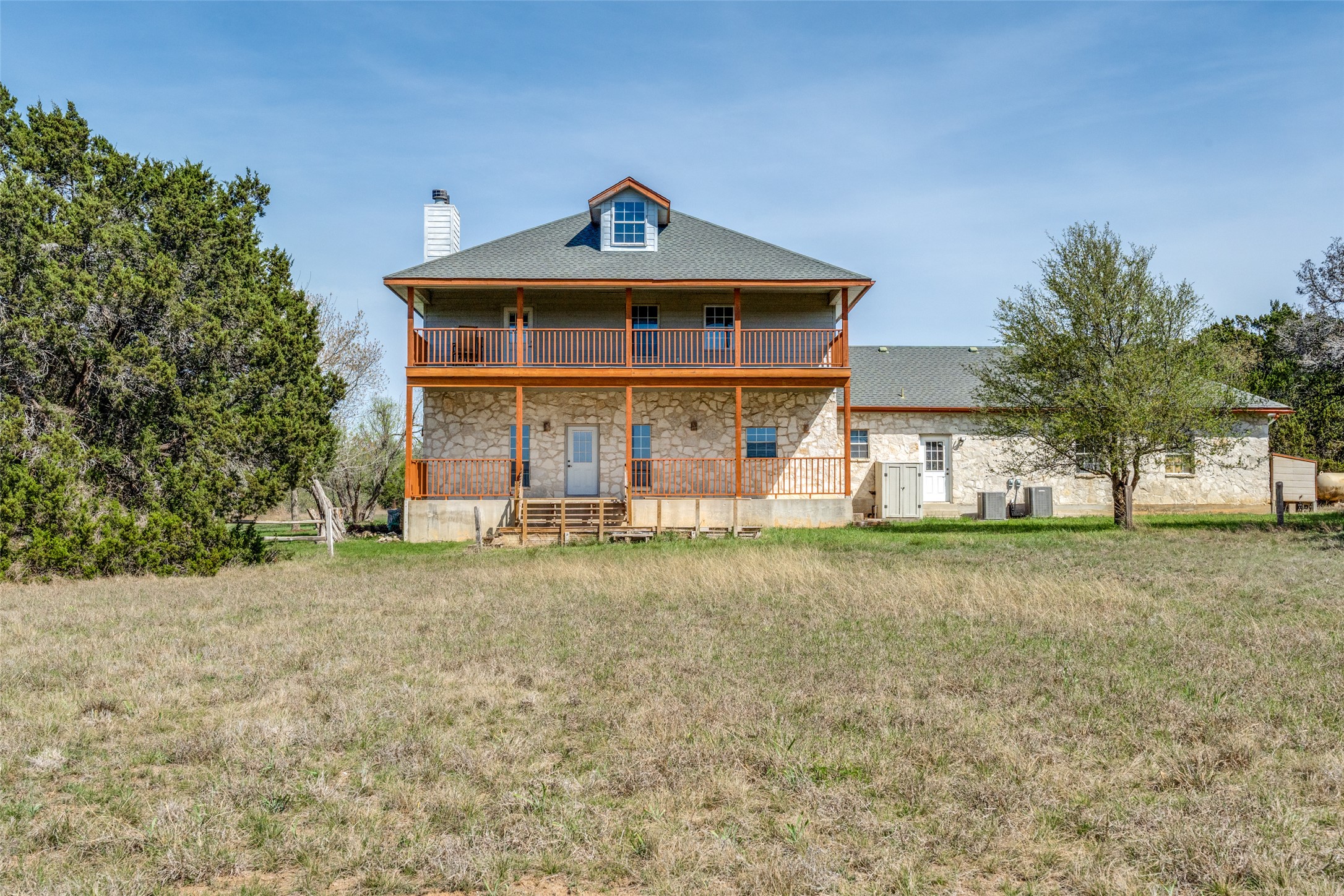 34970 Smithson Valley Road Bulverde, TX 78163 - Photo 5 of 36 a front view of a house with a yard