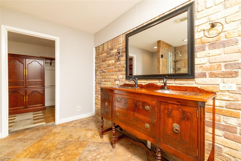 637 Post Oak Drive Hurst, TX 76053 - Photo 22 of 35 Primary Bathroom and walk in closet