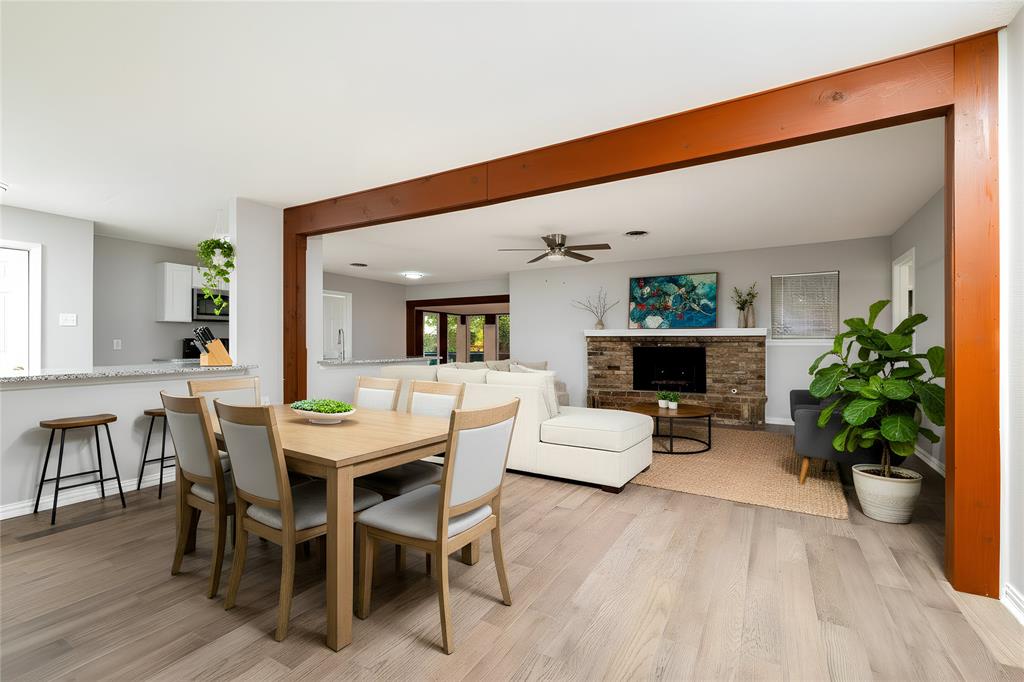 637 Post Oak Drive Hurst, TX 76053 - Photo 5 of 35 Virtually Staged Living and dining area