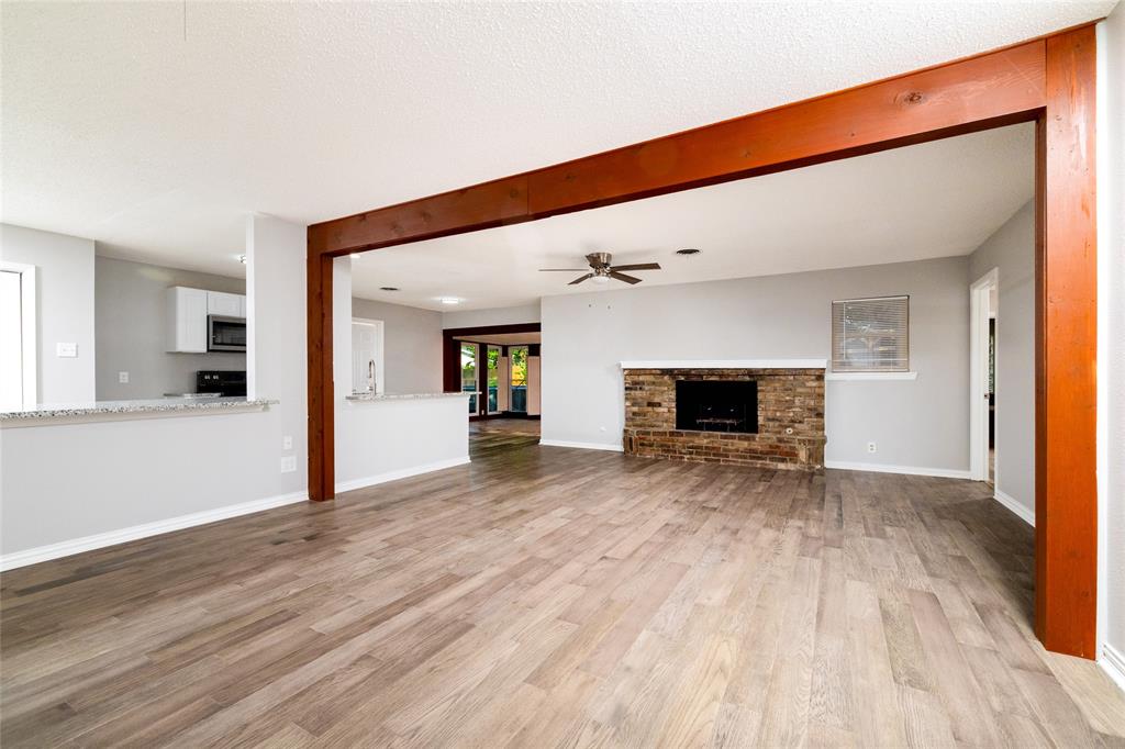 637 Post Oak Drive Hurst, TX 76053 - Photo 6 of 35 Living and dining space