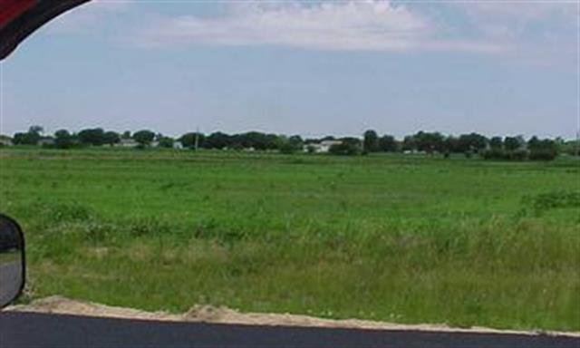 723 Keller Drive Dixon, IL 61021 - Photo 3 of 6 a view of a lush green outdoor space with a swimming pool