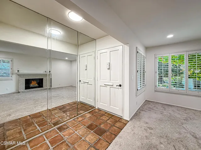 a view of a livingroom with a staircase