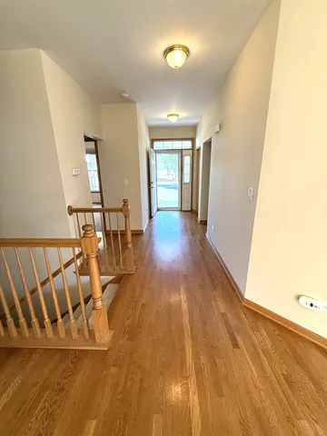 a view of entryway with wooden floor
