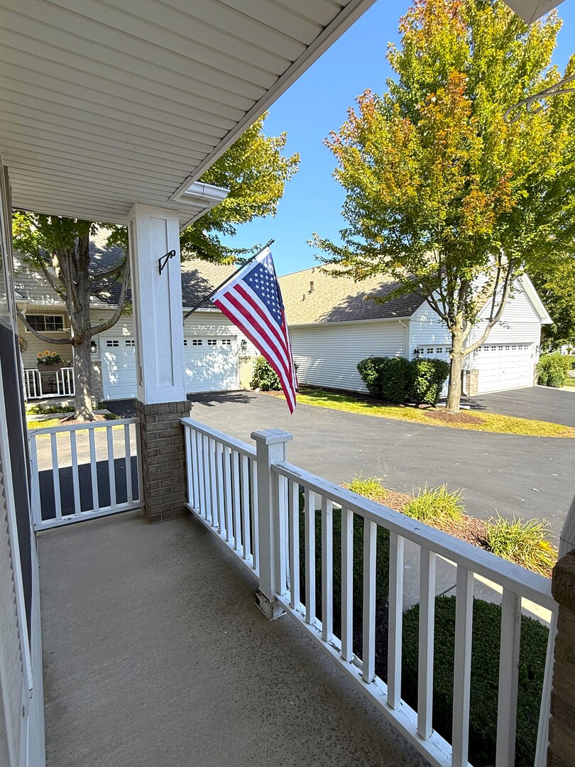 1604 Augusta Lane Shorewood, IL 60404 - Photo 2 of 32 a view of a balcony with city view