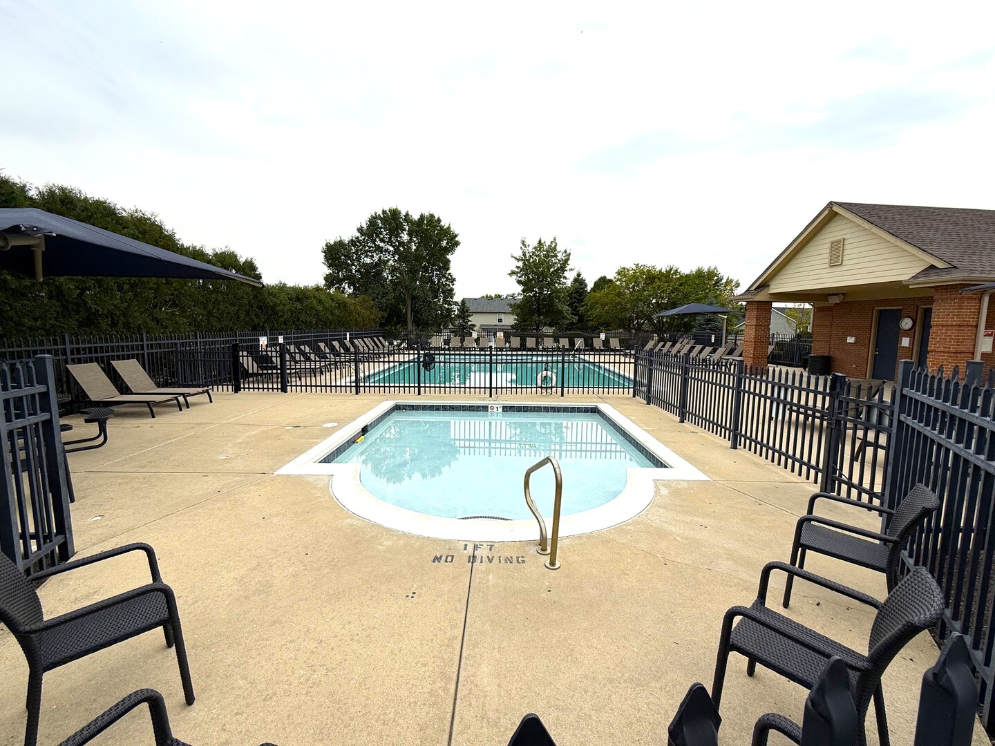 1604 Augusta Lane Shorewood, IL 60404 - Photo 28 of 32 a view of a swimming pool with a lounge chair