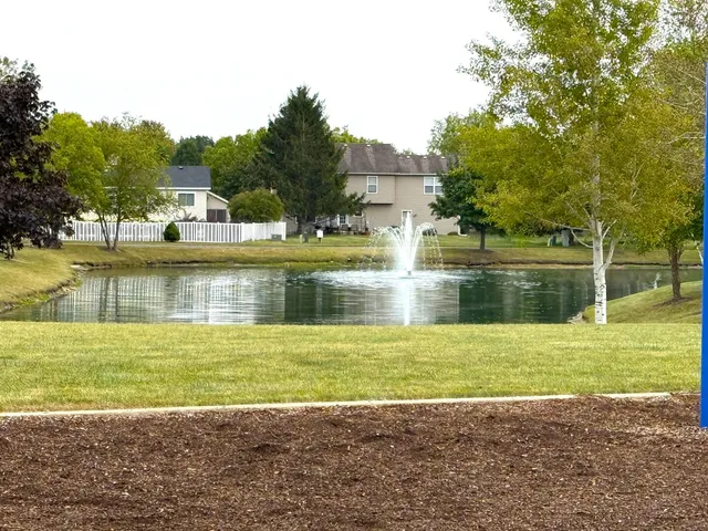 a view of a lake with a house