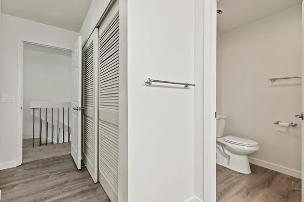 a bathroom with a sink a mirror and a light fixture