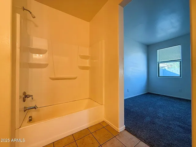 a view of small space with wooden floor