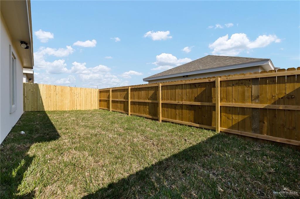 1322 Beverly Avenue Weslaco, TX 78596 - Photo 12 of 17 a view of backyard with green space