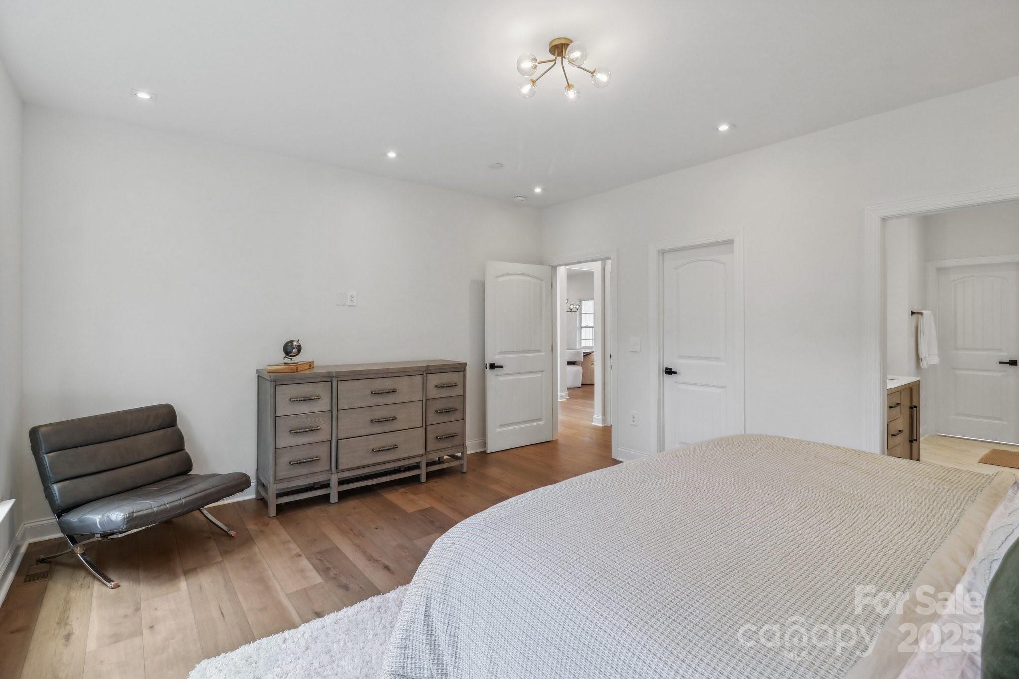 545 Morrison Farm Road Troutman, NC 28166 - Photo 19 of 31 a bedroom with a bed and furniture