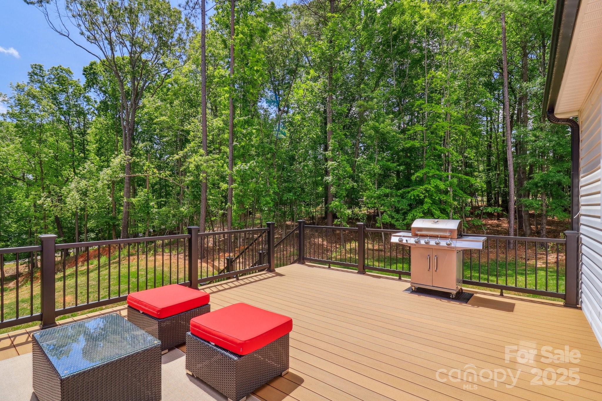 545 Morrison Farm Road Troutman, NC 28166 - Photo 30 of 31 a view of a backyard with sitting area