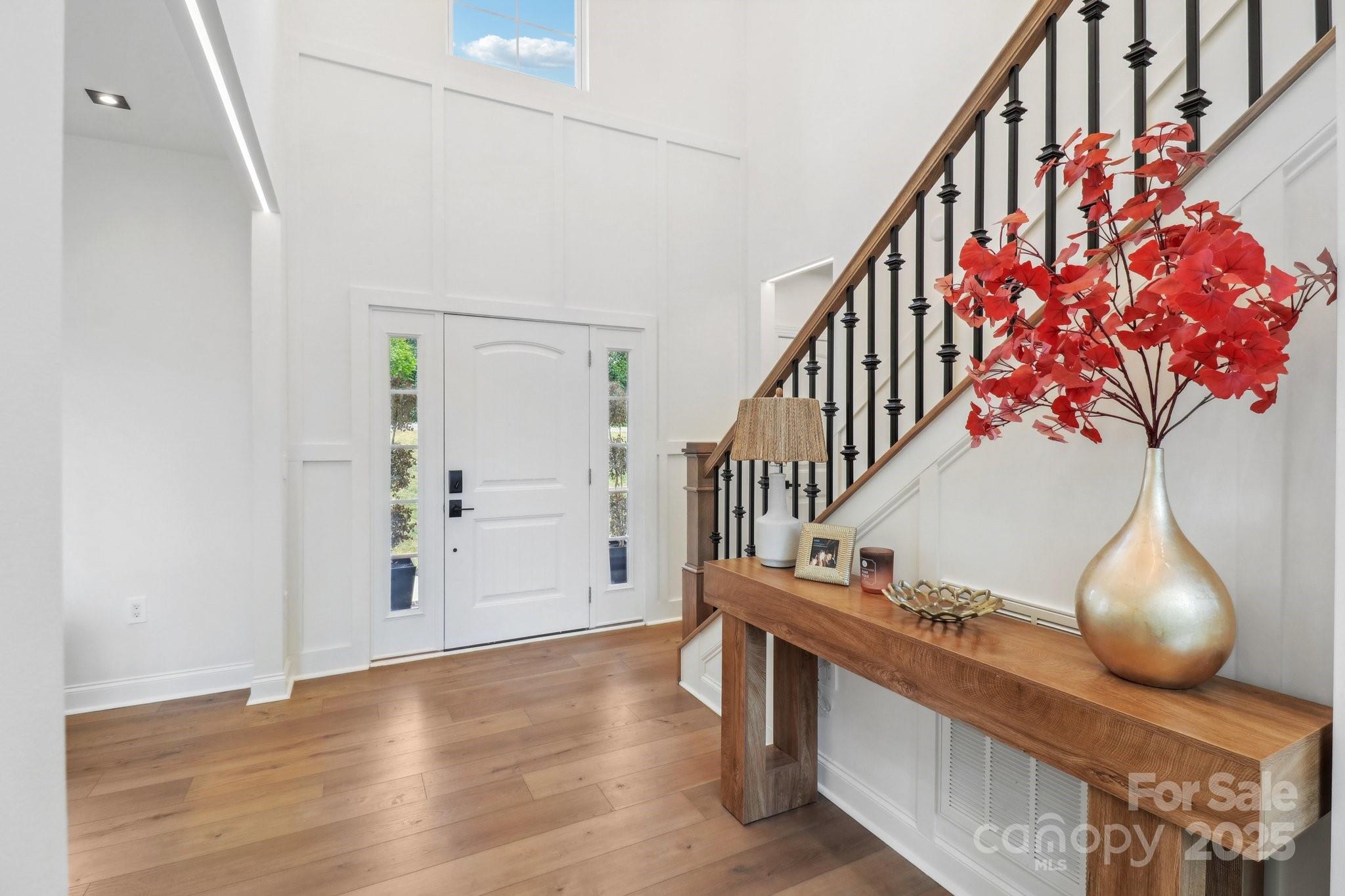 545 Morrison Farm Road Troutman, NC 28166 - Photo 3 of 31 a view of entryway with wooden floor