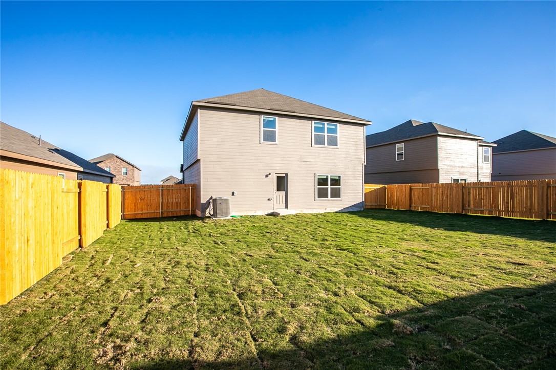 19024 Quiet Range Drive Elgin, TX 78621 - Photo 28 of 30 a house view with a outdoor space