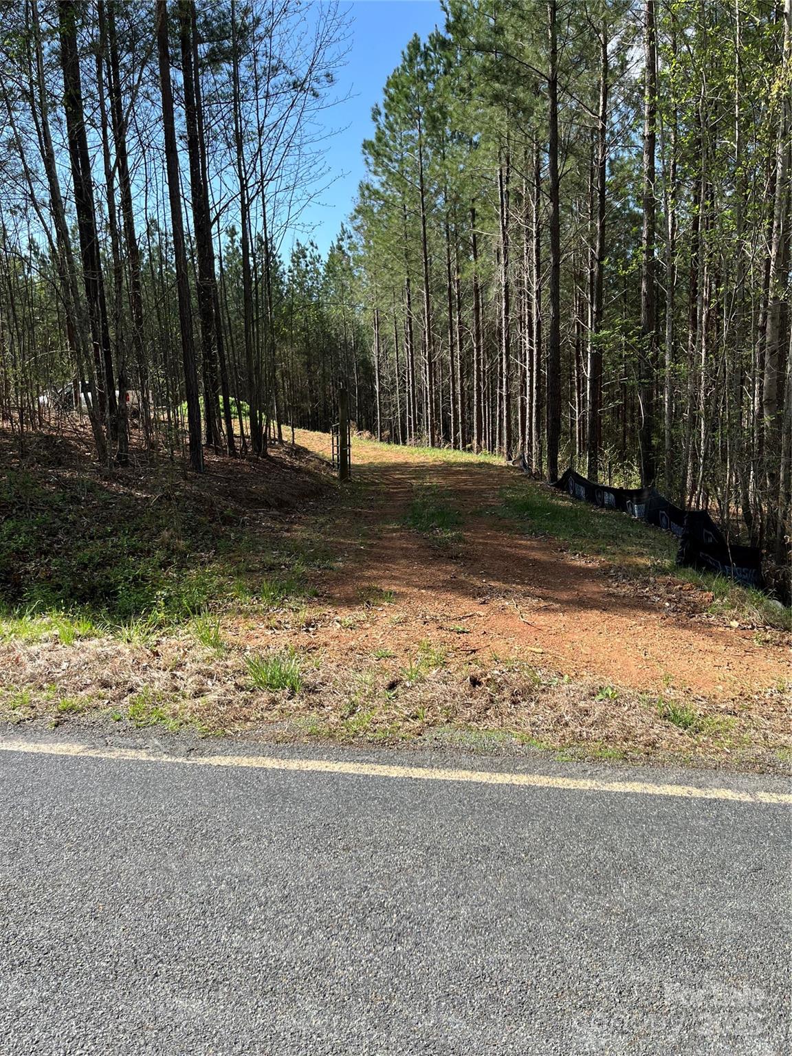 10400 Fink Road Mount Pleasant, NC 28124 - Photo 1 of 6 a view of a yard with large trees