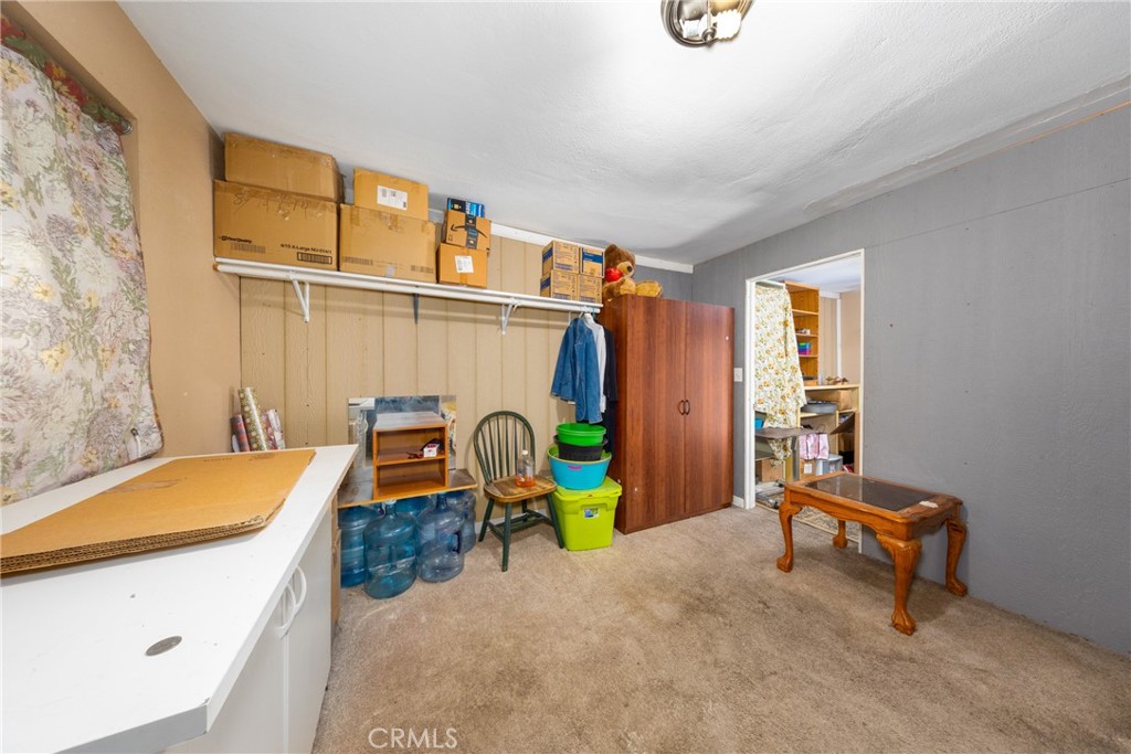 566 South Sage Avenue Rialto, CA 92376 - Photo 27 of 28 a bedroom with furniture and a window