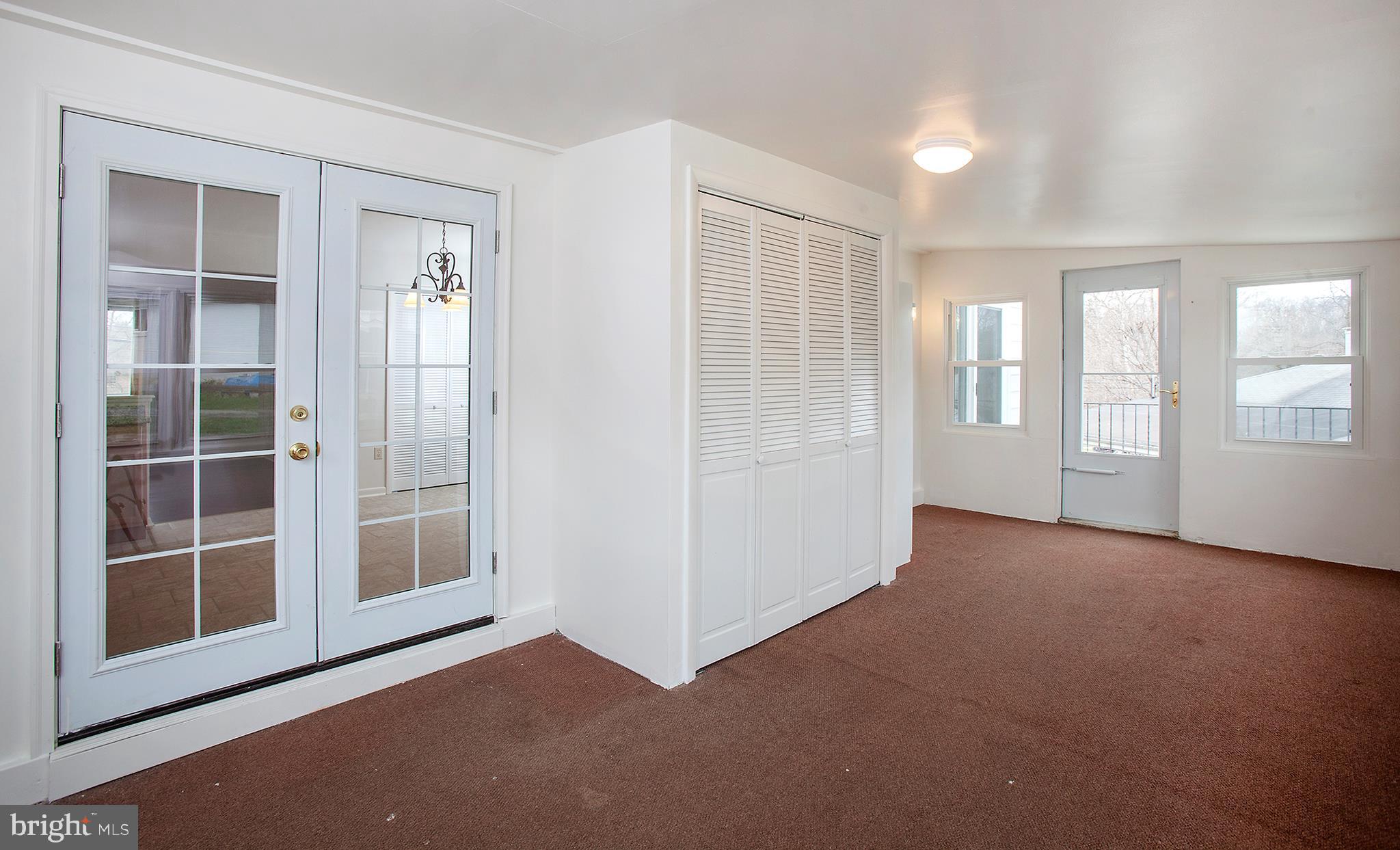 15 Stephen Road Camp Hill, PA 17011 - Photo 11 of 28 Sunroom with Washer/Dryer Hook up in Closet.