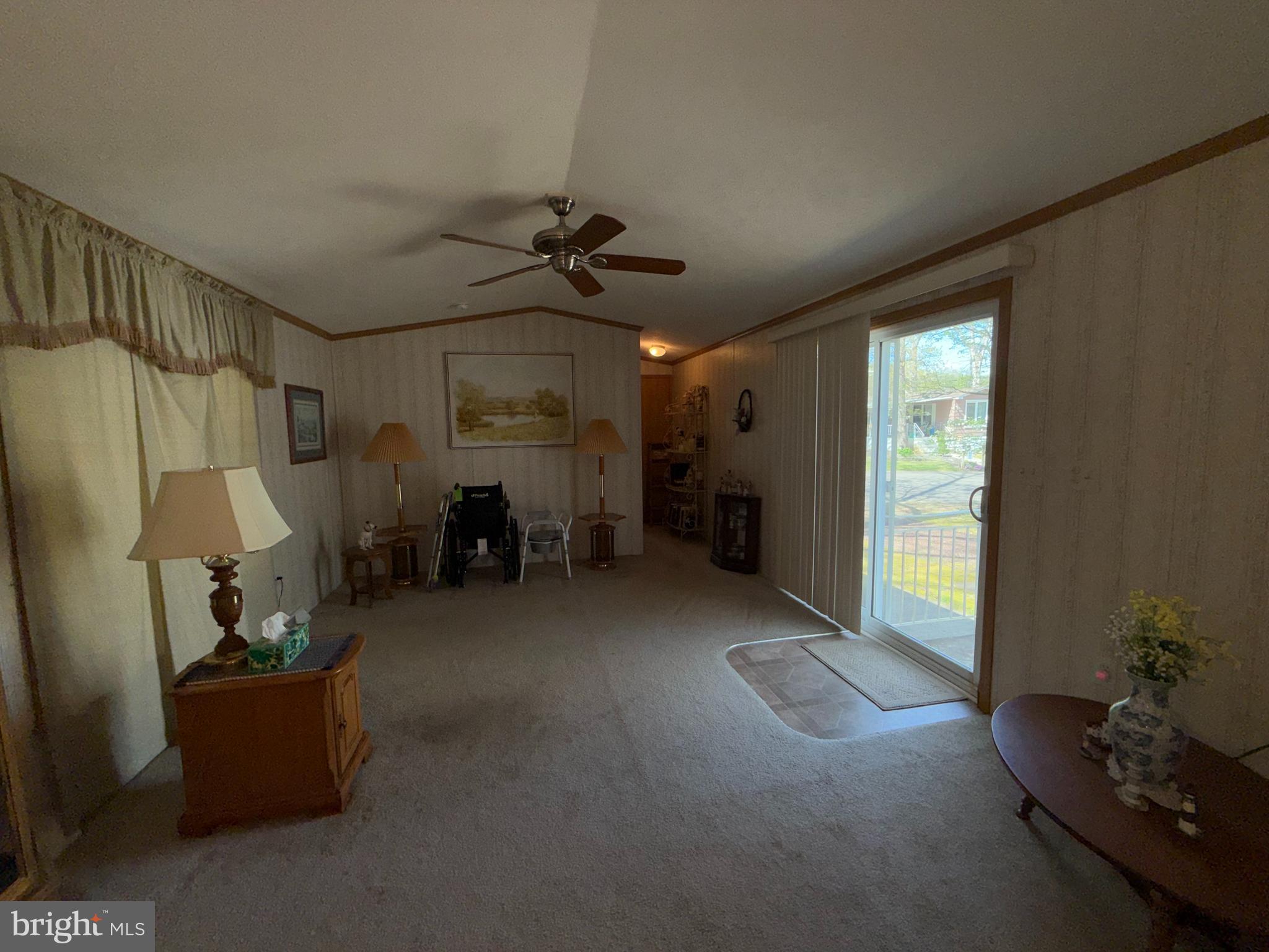 21 Dogwood East Tabernacle, NJ 08088 - Photo 5 of 12 a living room with furniture and a flat screen tv