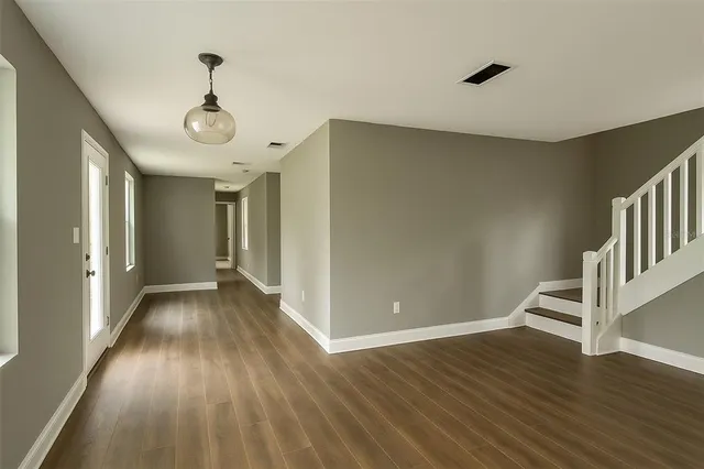 a view of entryway with wooden floor