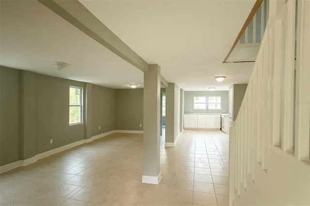 a view of livingroom with an empty space and window
