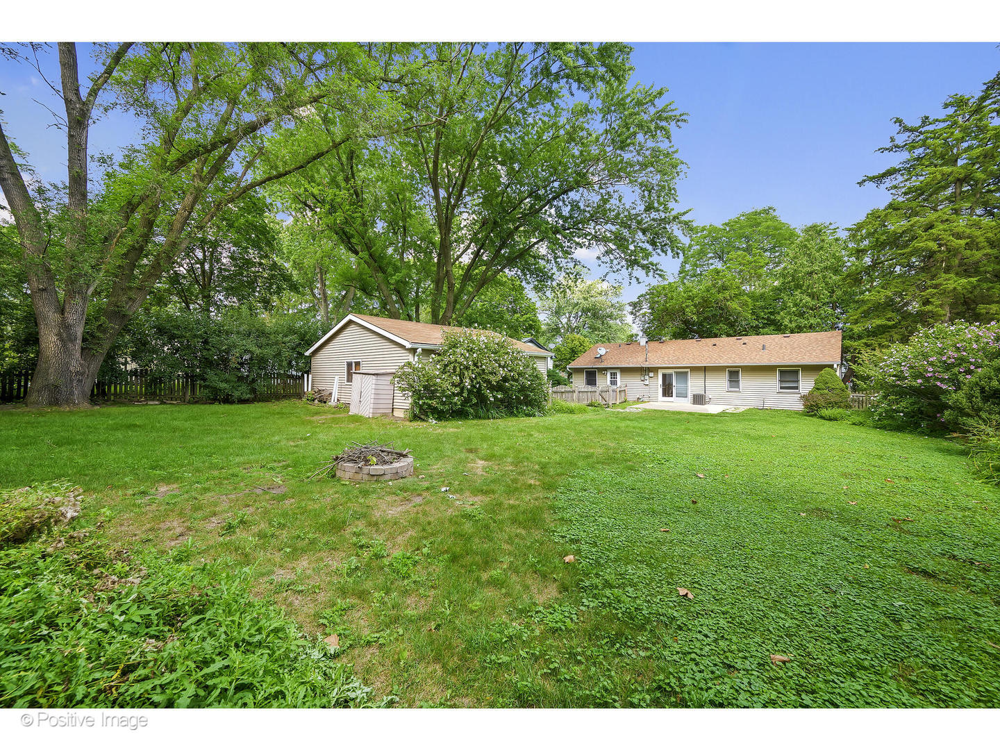 1120 Grant Street Wheaton, IL 60189 - Photo 17 of 17 a view of a house with a yard and sitting area