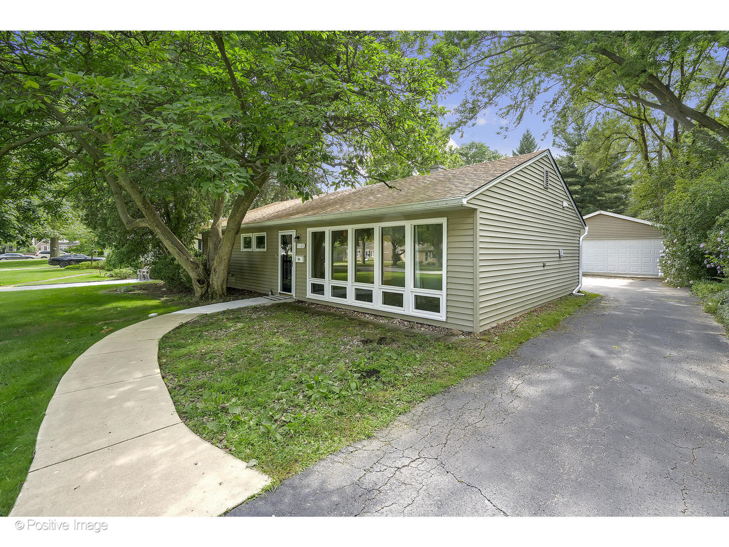 1120 Grant Street Wheaton, IL 60189 - Photo 2 of 17 a view of a house with a backyard