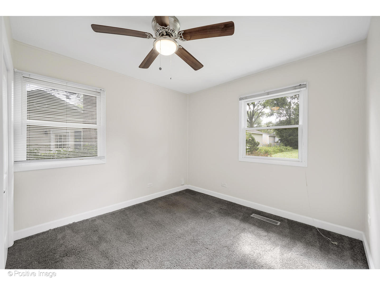 1120 Grant Street Wheaton, IL 60189 - Photo 9 of 17 a view of an empty room with a window