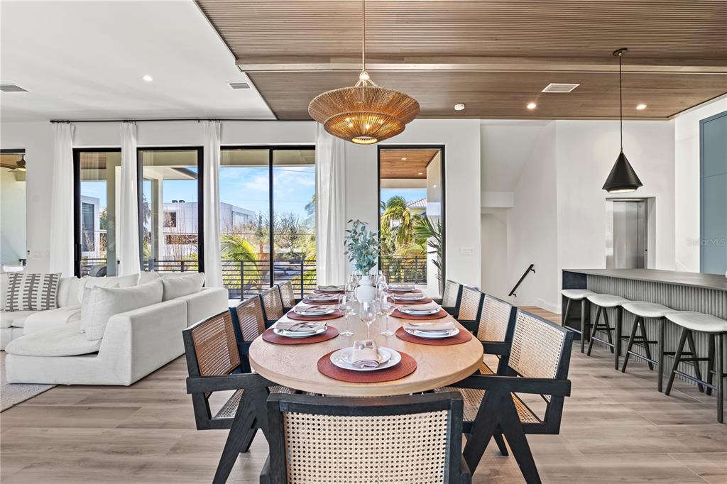 7007 Point Of Rocks Road Sarasota, FL 34242 - Photo 20 of 62 a view of a dining room with furniture window and outside view