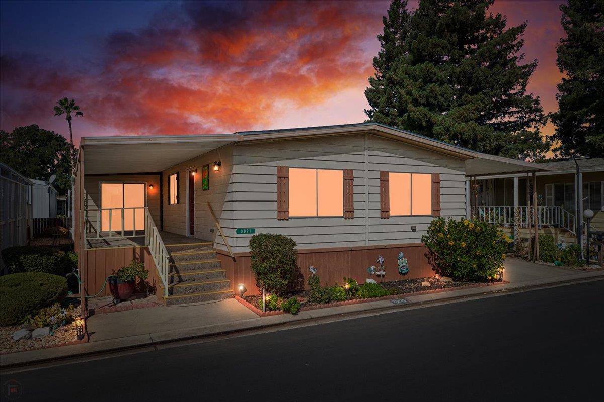 a front view of a house with yard
