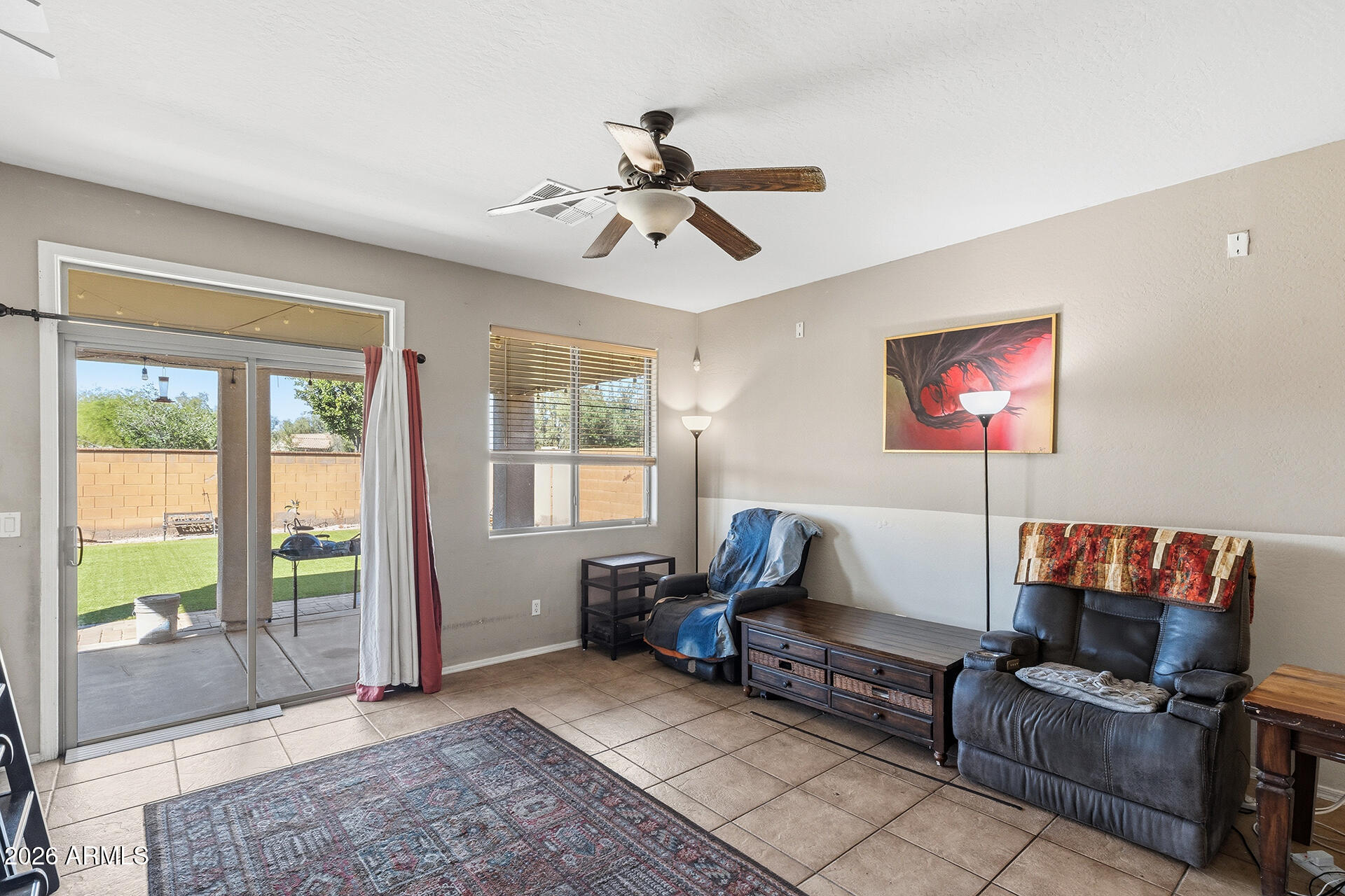 6718 West Darrel Road Laveen, AZ 85339 - Photo 39 of 49 a living room with furniture and a window