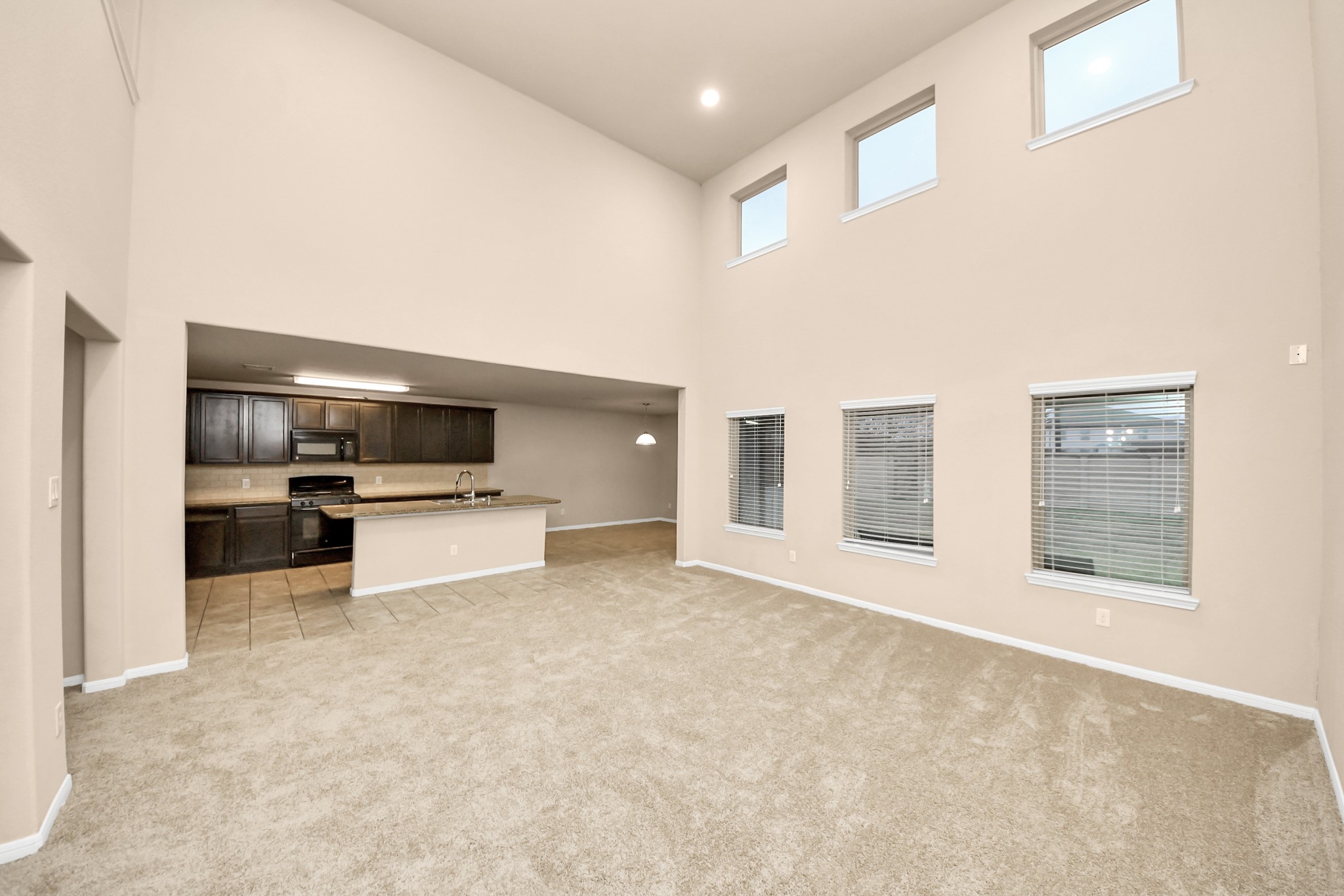 9326 Limestone Ranch Lane Richmond, TX 77407 - Photo 27 of 50 a view of a kitchen with a sink