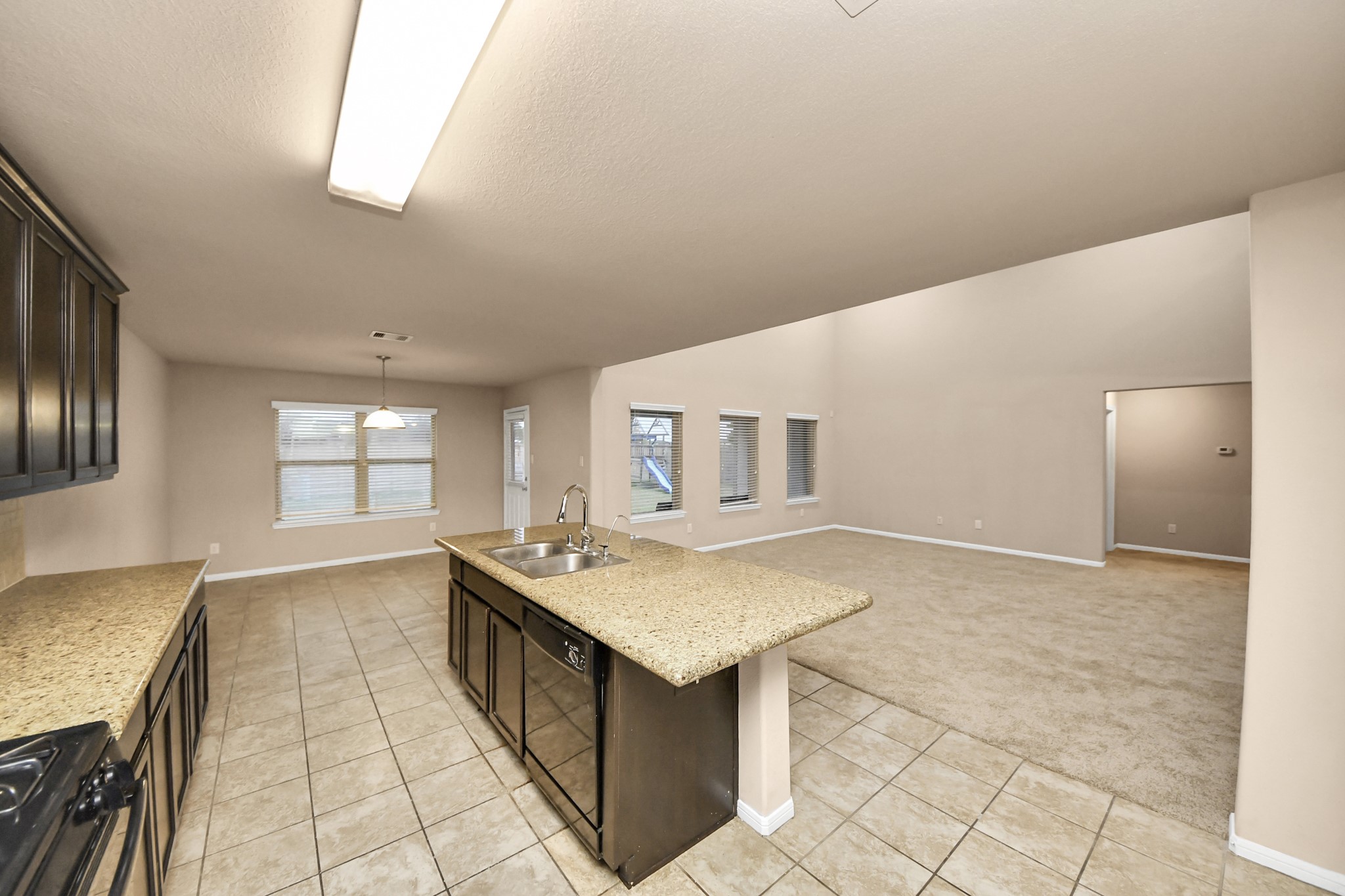 9326 Limestone Ranch Lane Richmond, TX 77407 - Photo 34 of 50 a view of kitchen with windows