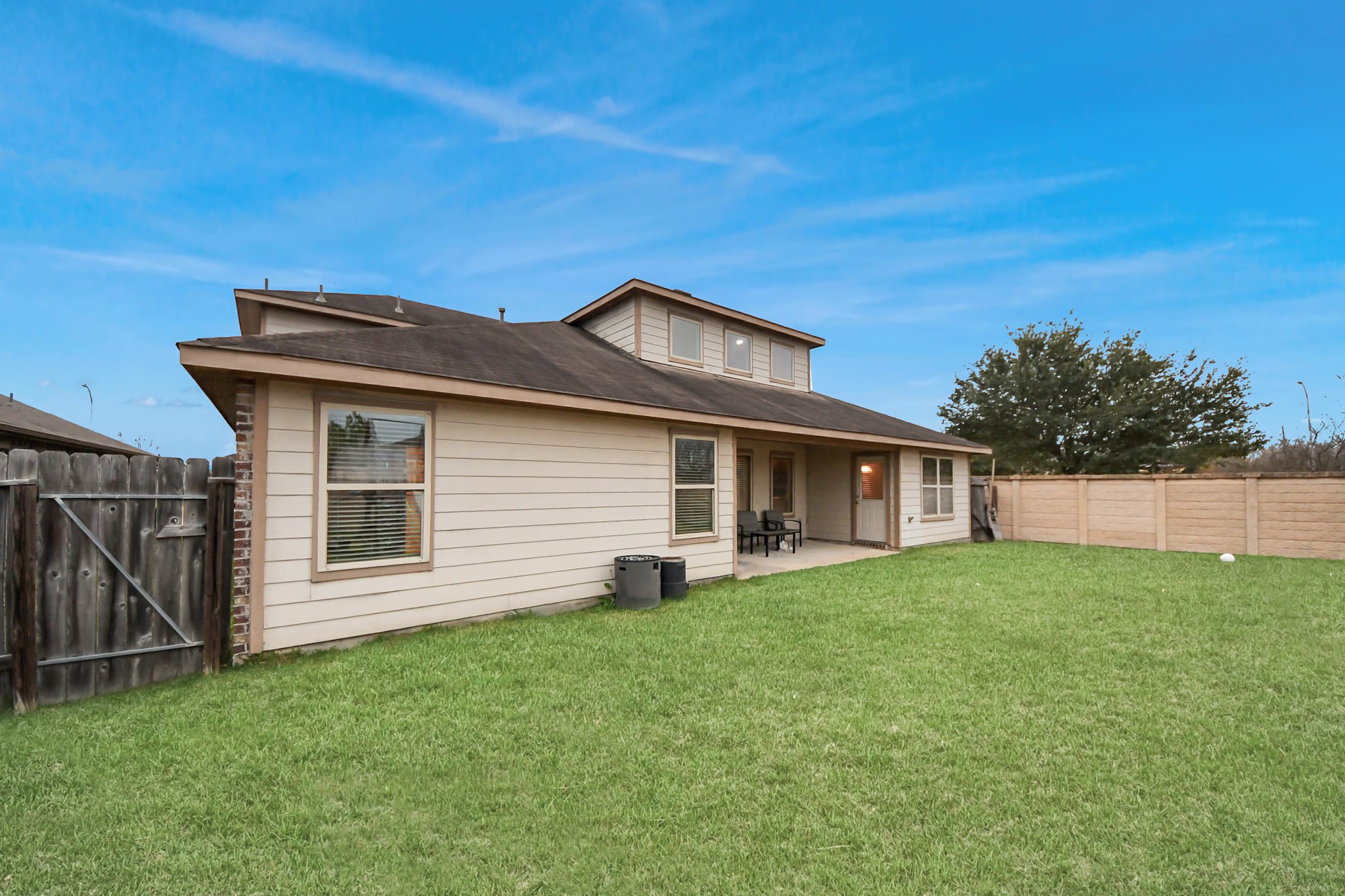 9326 Limestone Ranch Lane Richmond, TX 77407 - Photo 45 of 50 a front view of a house with a yard