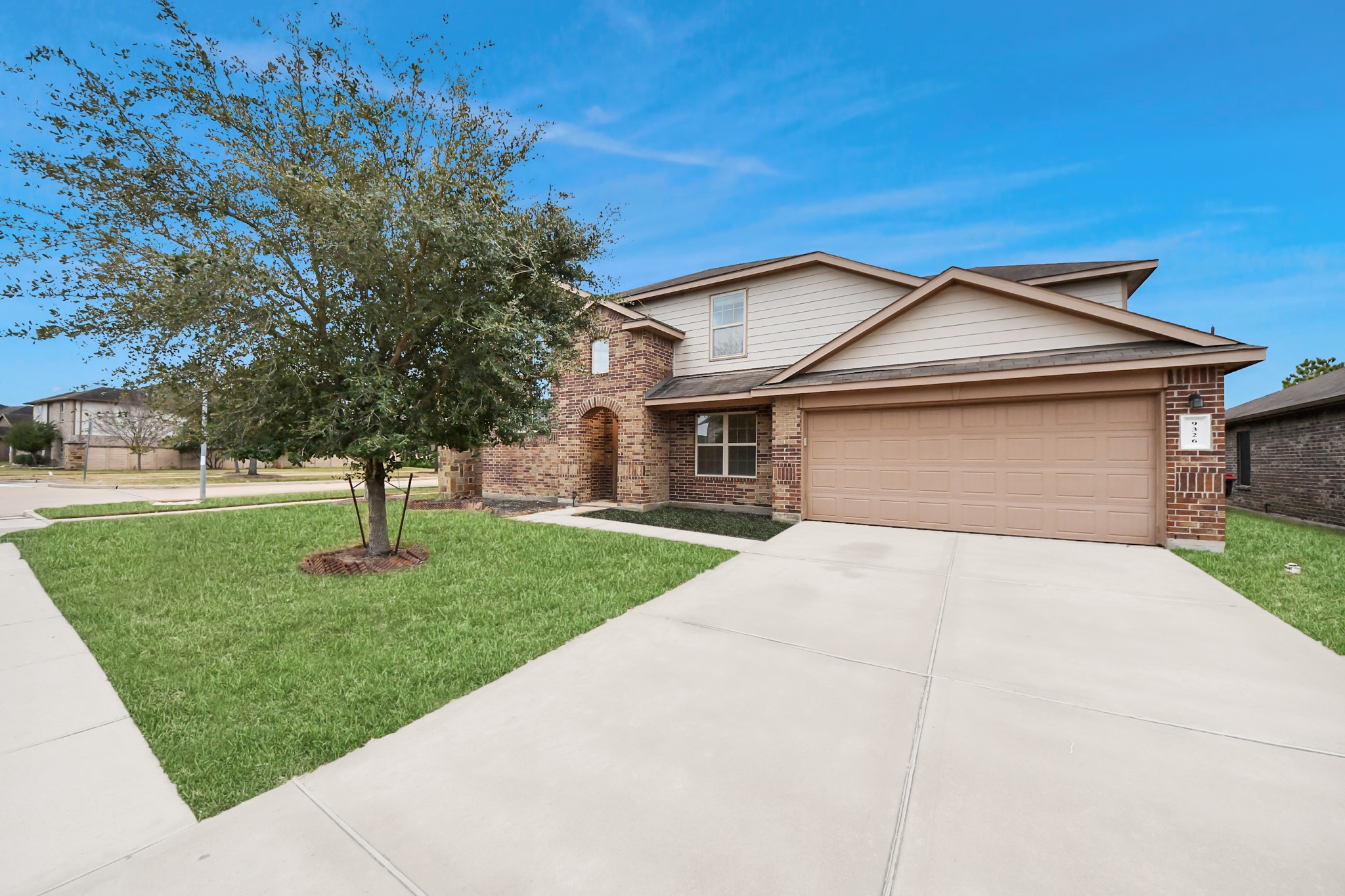 9326 Limestone Ranch Lane Richmond, TX 77407 - Photo 6 of 50 a front view of a house with a yard