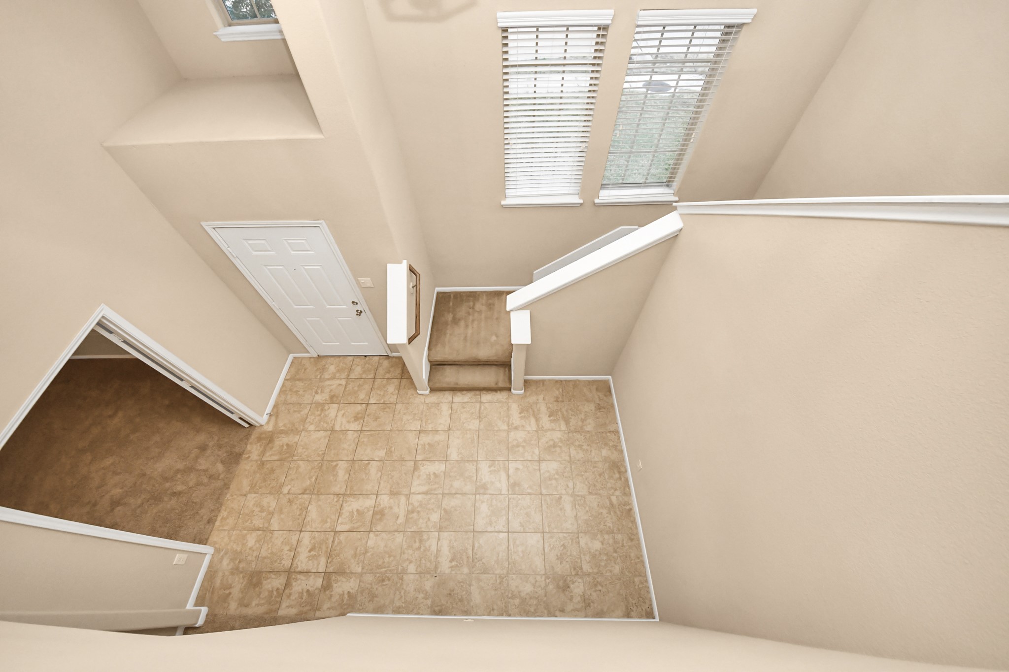 9326 Limestone Ranch Lane Richmond, TX 77407 - Photo 8 of 50 a view of an empty room with wooden floor and a window