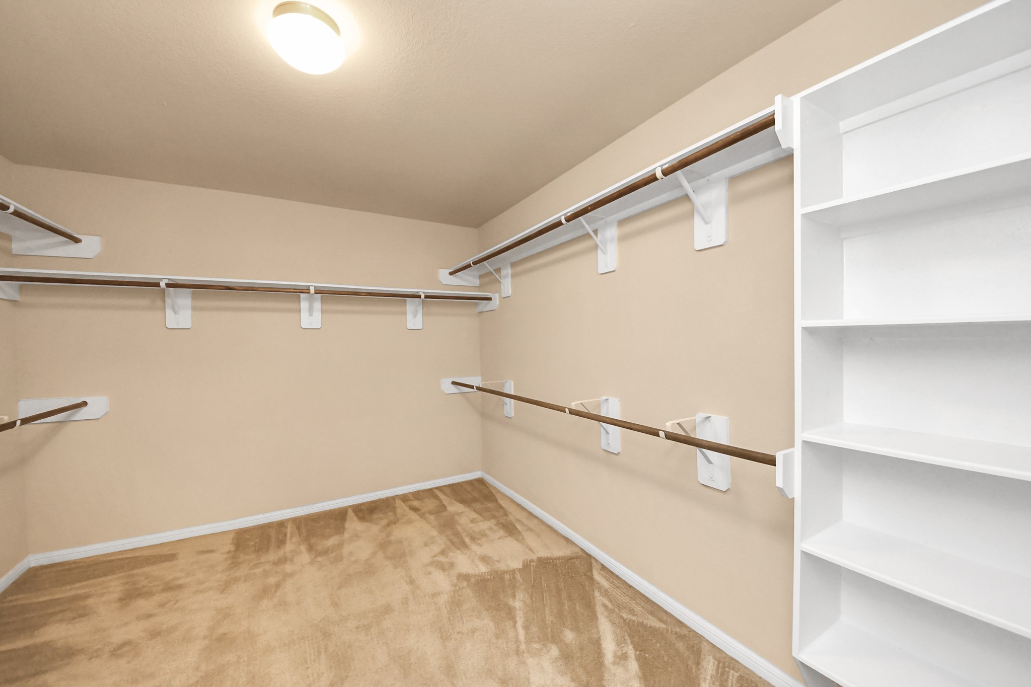 9326 Limestone Ranch Lane Richmond, TX 77407 - Photo 10 of 50 a view of an empty walk in closet