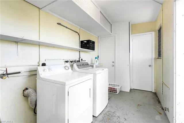 a living room with furniture a flat screen tv and a large window