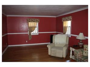 407 Florida Grove Road Perth Amboy, NJ 08861 - Photo 4 of 9 a front view of a house with wooden floor