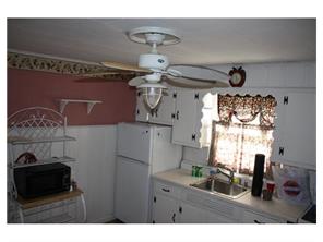 407 Florida Grove Road Perth Amboy, NJ 08861 - Photo 5 of 9 a bathroom with a sink mirror and window