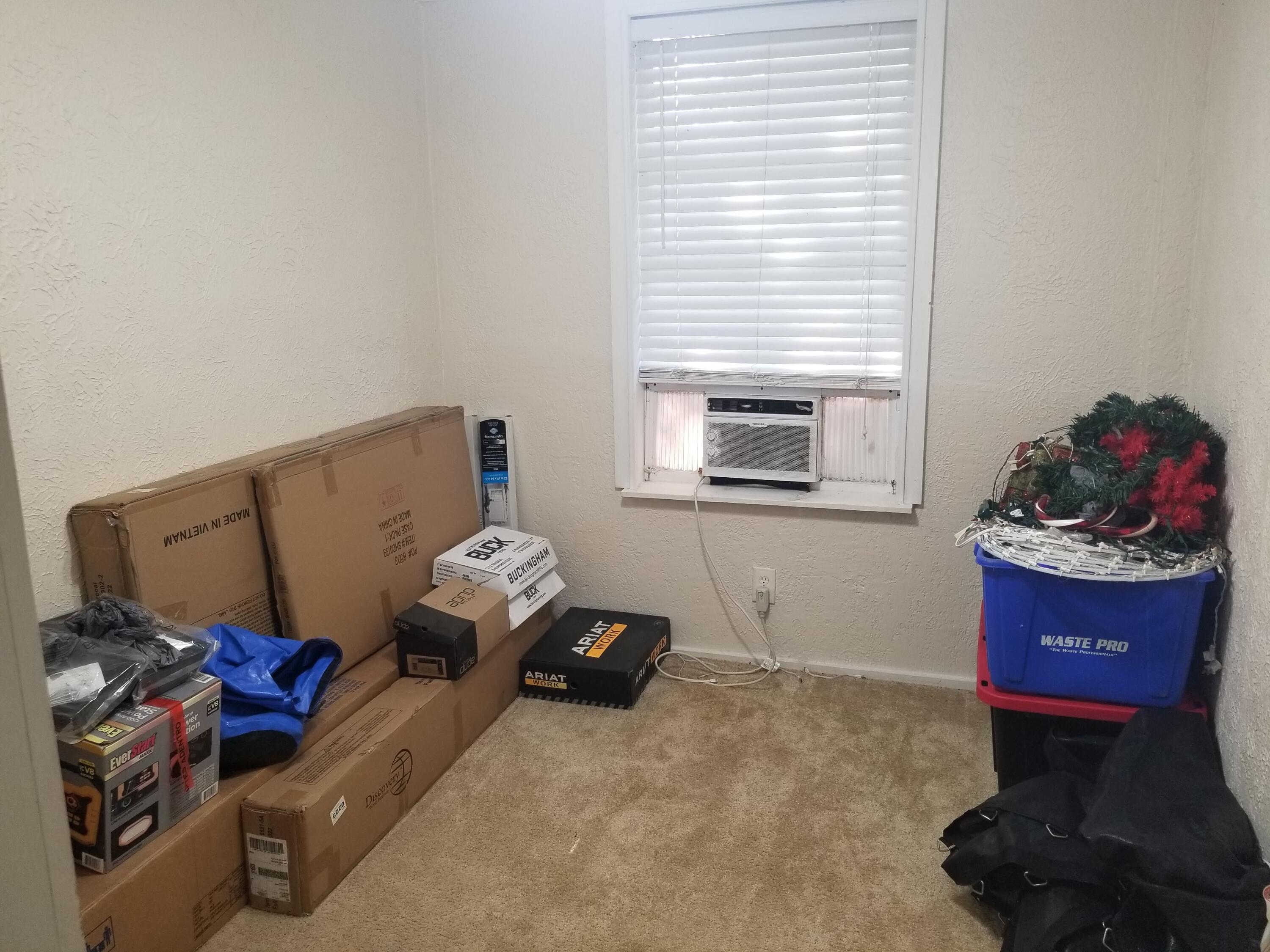 1224 Raymond Avenue Fort Pierce, FL 34950 - Photo 11 of 27 a living room with furniture and a window