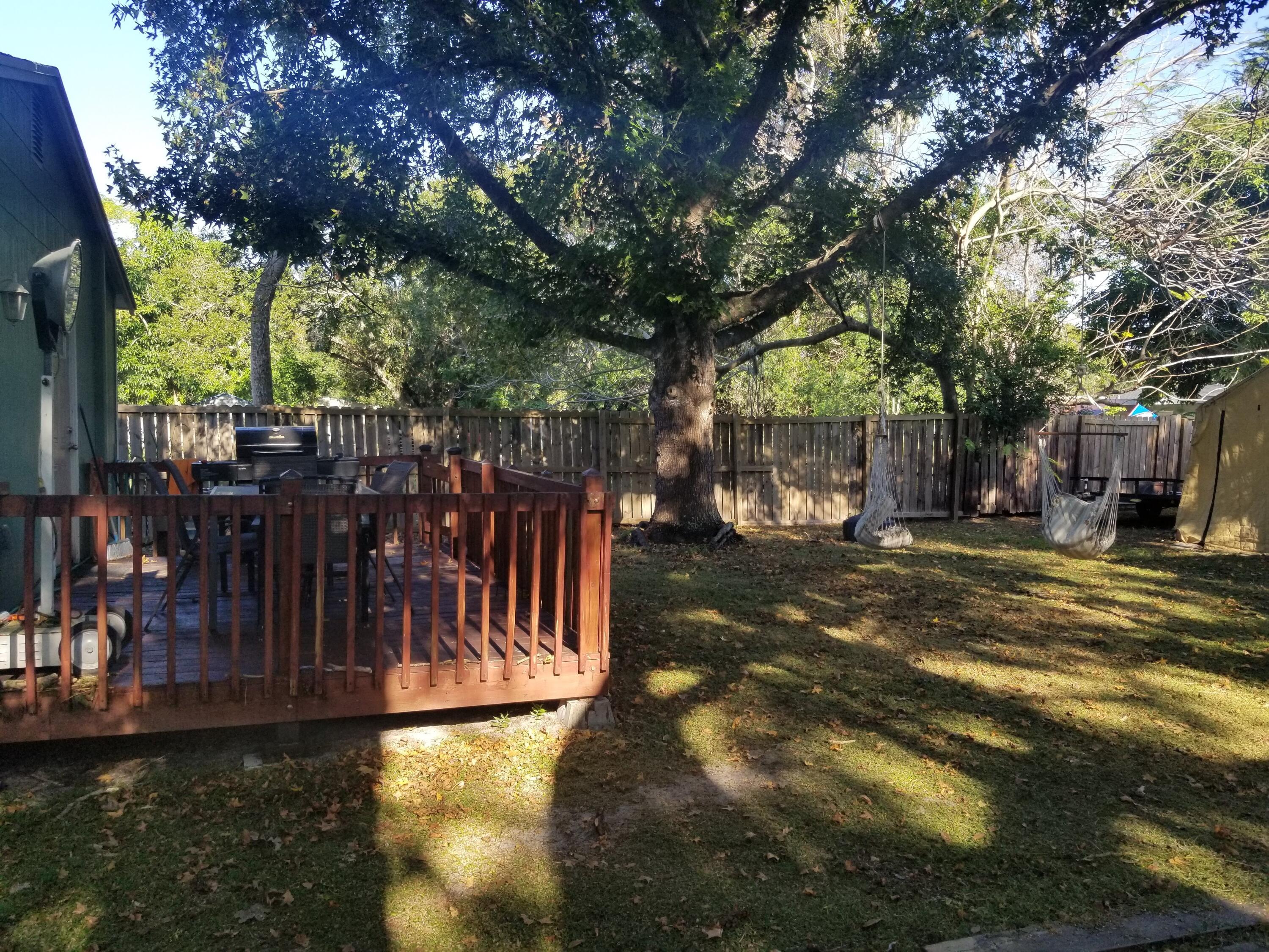 1224 Raymond Avenue Fort Pierce, FL 34950 - Photo 19 of 27 a view of a street with houses