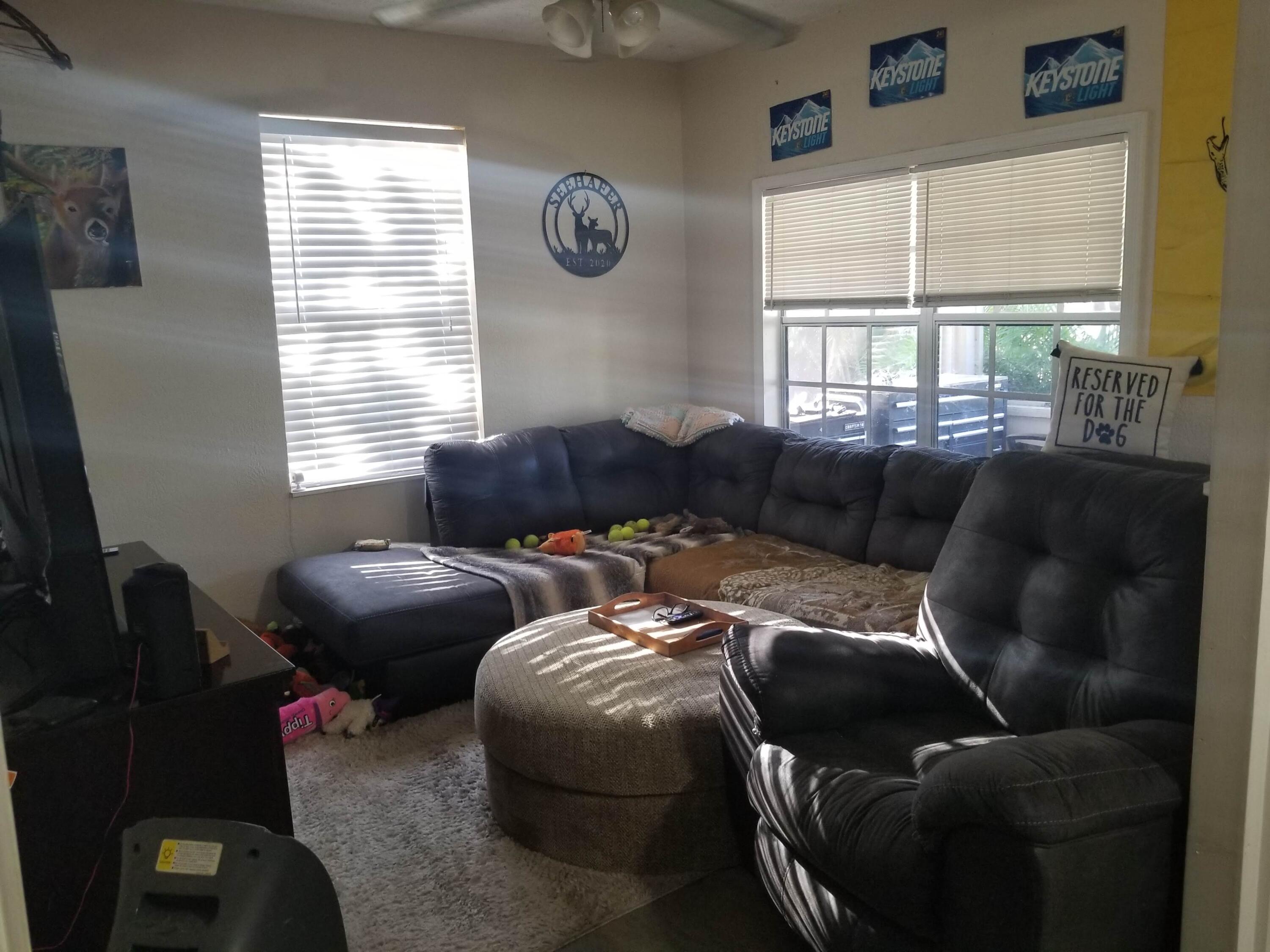 1224 Raymond Avenue Fort Pierce, FL 34950 - Photo 6 of 27 a living room with furniture and a window